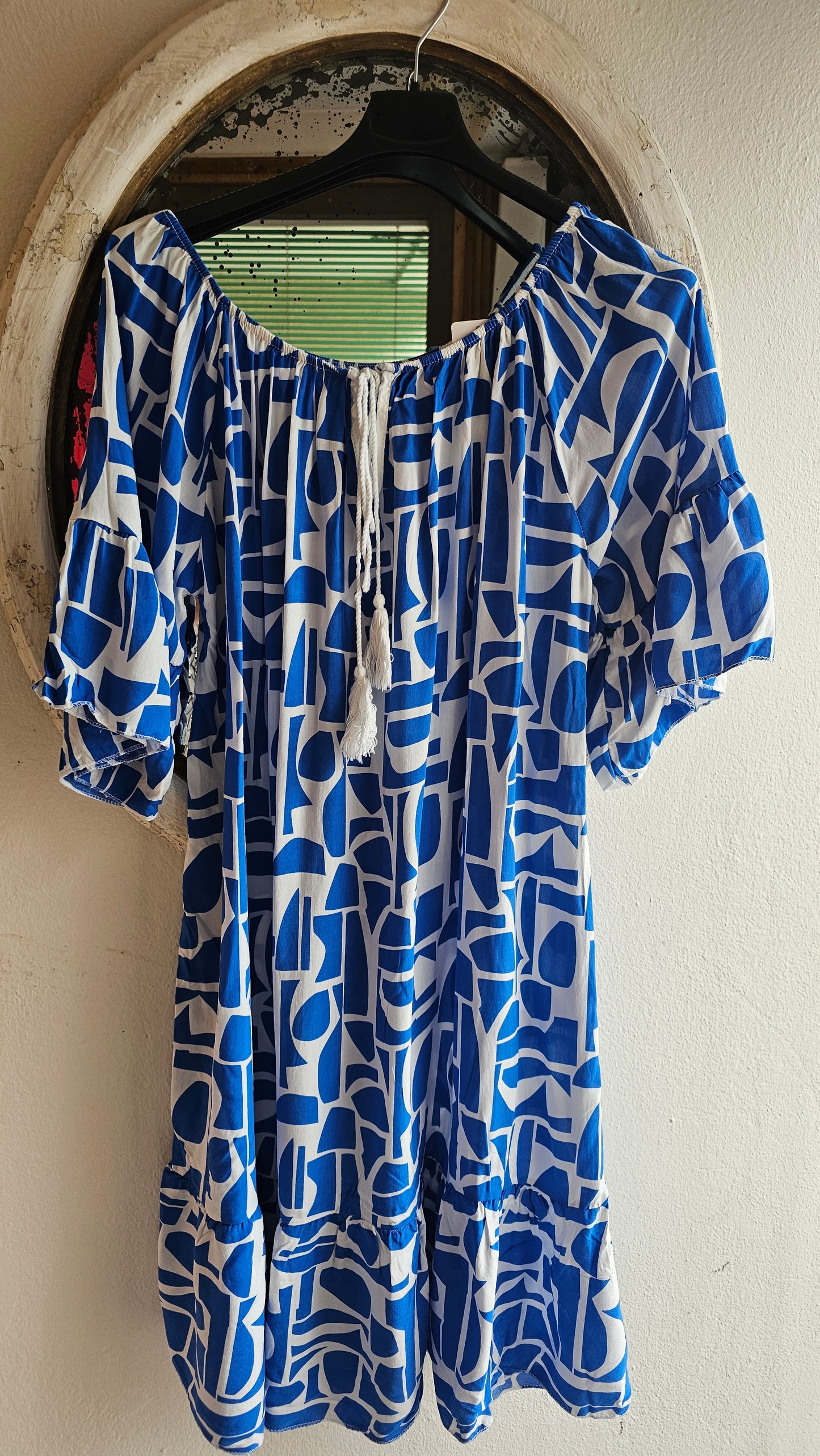Kesämekko oranssi ja sähkön sininen